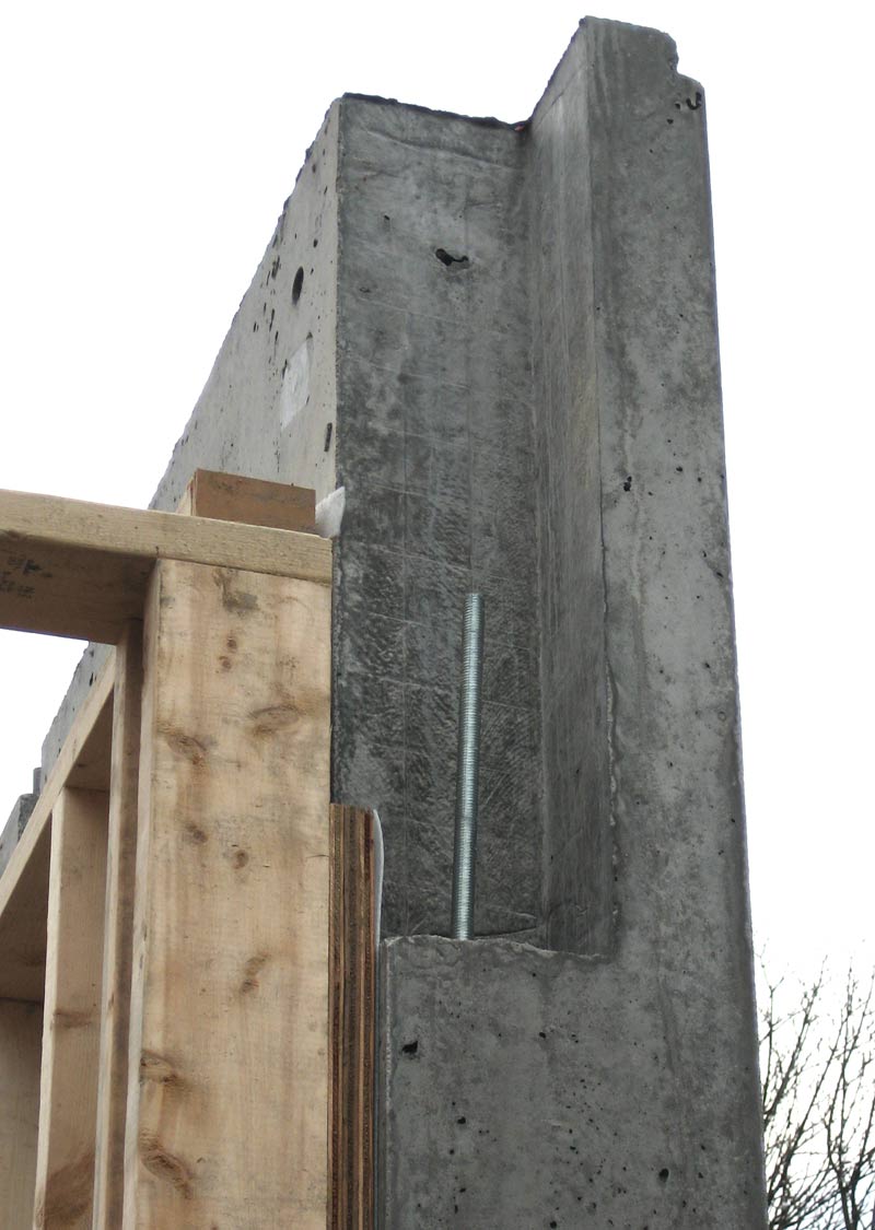 connection-detail-between-concrete-wall-and-steel-beam-seat-with-an-anchor-bolt-prepped-up-for-steel-beam