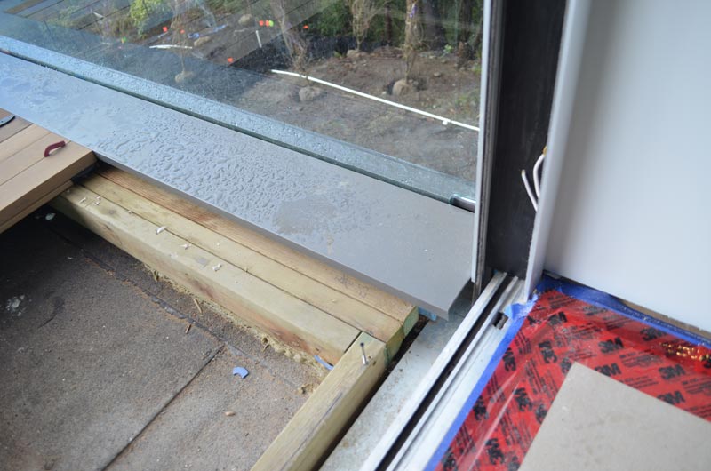 WOOD-DECK-OVER-SLEEPERS-AT-GLASS-GUARD---FLASHING-DETAIL